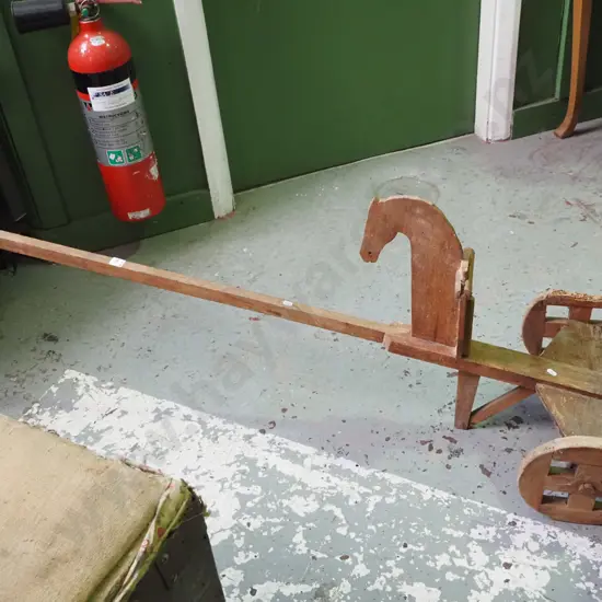 restorer's homemade child's horse themed trolley