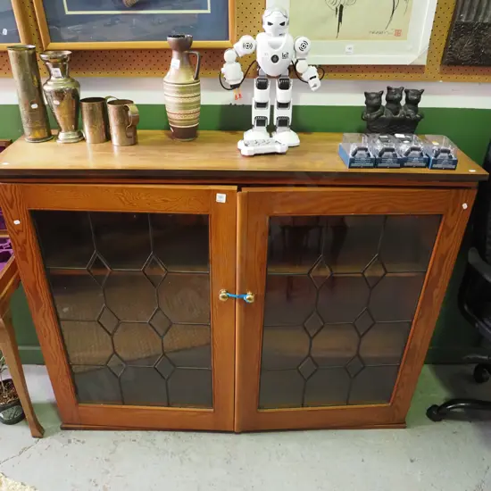 mixed timbers 2 door display cabinet with bevelled edge glass leadlight doors H-1120 W-1410 D-360