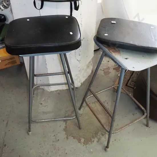 2x industrial black vinyl stools - adjustable legs, some rust