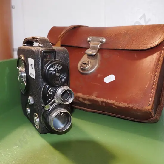 vintage cine camera, small leather satchel