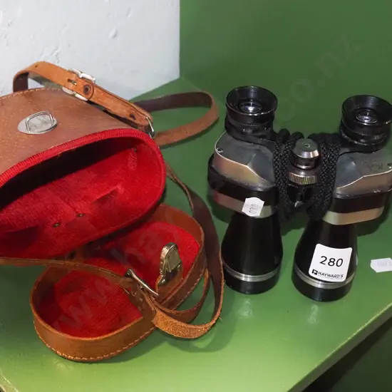 leather cased Comet 10x30 field binoculars