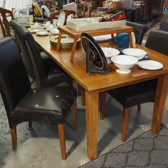 solid wood dining table with 6 matching chairs - scratches and markings to chairs 