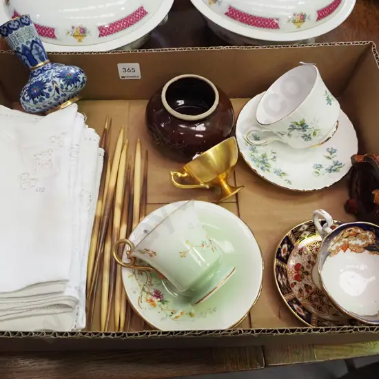 box: napkins, porcupine? quills, cloisonne vase, etc.