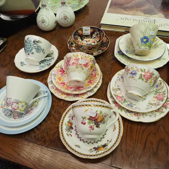 4 trios, 3 cups and saucers