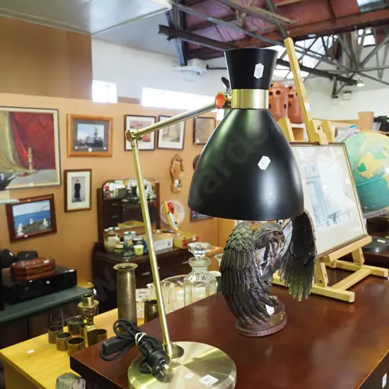 brass and black metal adjustable desk lamp