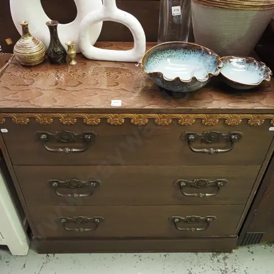 chip board and mahogany 3 drawer chest with snakeskin vinyl top H-725 W-790 D-400