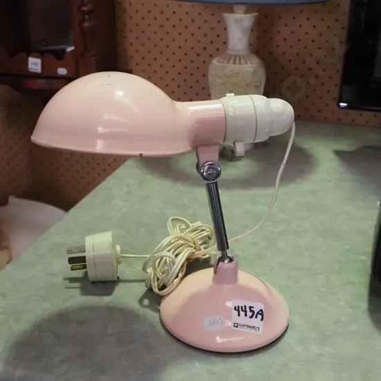 small metal bedside or clip on bed end lamp