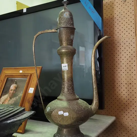 tall Middle Eastern brass coffee pot