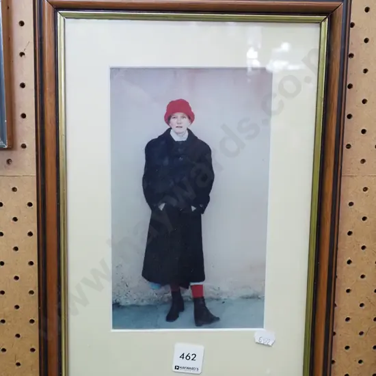 framed photograph - woman with red hat