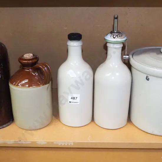 lidded storage crock, various bottles