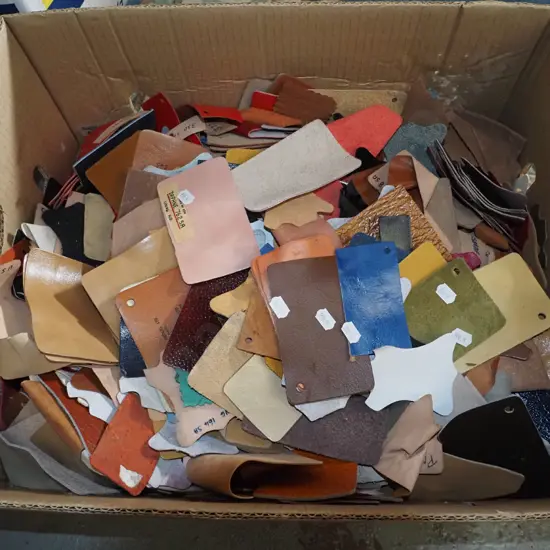 box of leather scraps