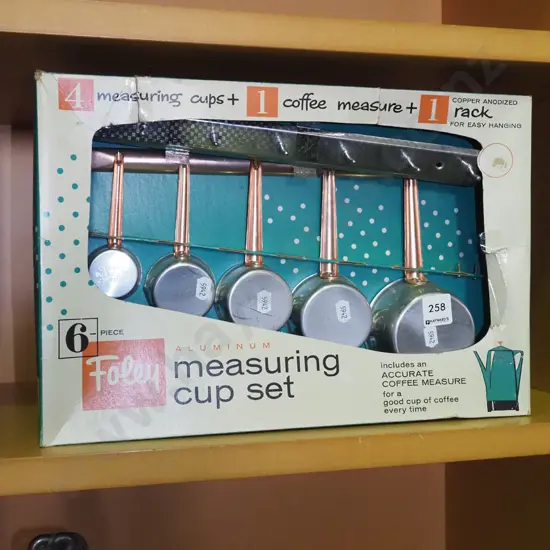 cased mid century aluminium measuring cup set