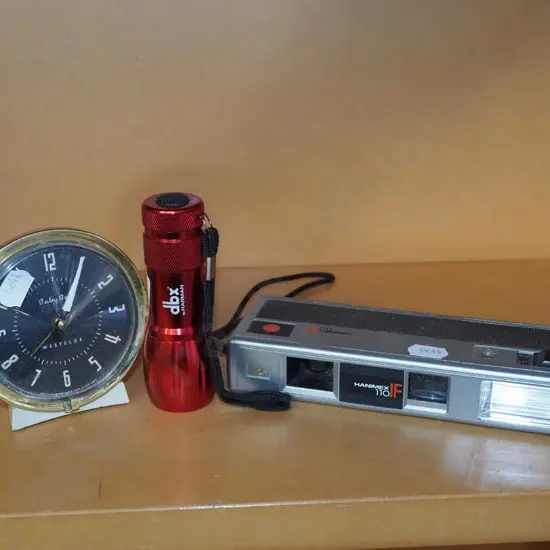 small torch, Haminex 110 camera, bedside clock