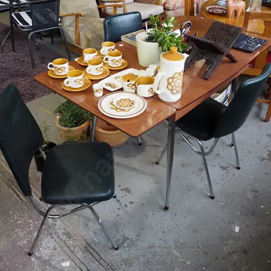 formica exteding dining table with 3 green vinyl chairs H-770 W-1470 D-755