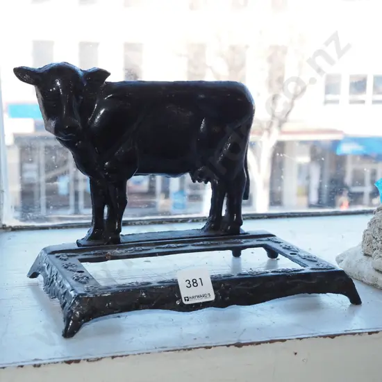 cast iron cow themed part boot scraper