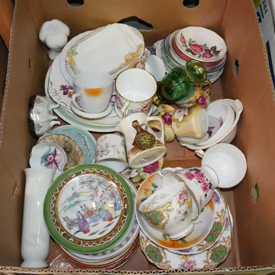 box; mismatched cups, jugs, plates etc
