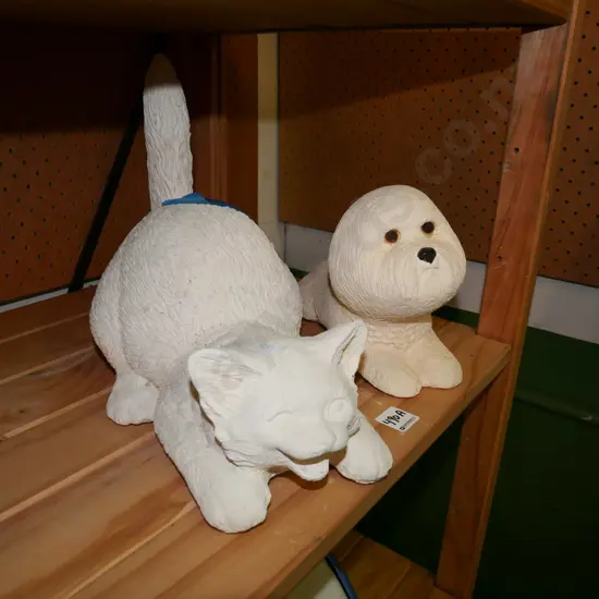 2x cast concrete or composite animal ornaments