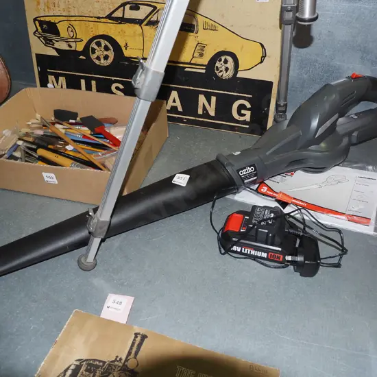 Ozito battery powered blower kit with battery and charger - battery in office