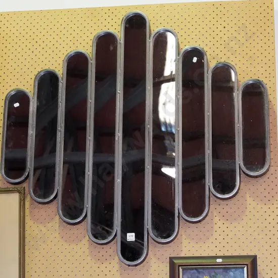 large industrial style segmented wall mirror