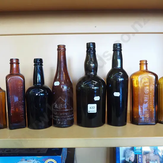 shelf of vintage amber bottles
