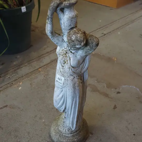 concrete garden ornament - woman carrying urn