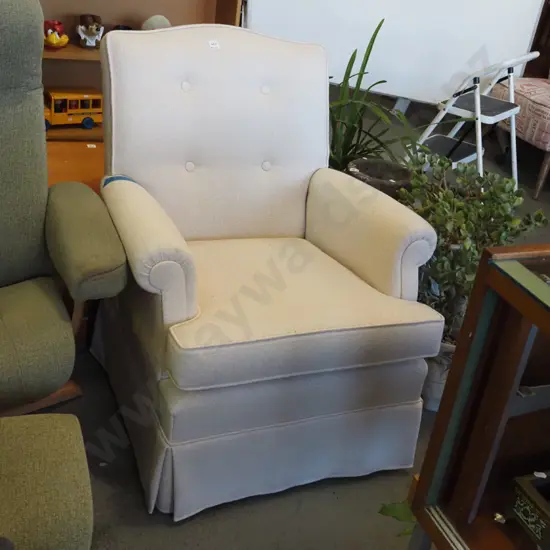 cream deep buttoned fireside chair