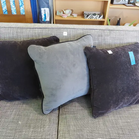 3x charcoal and grey cushions