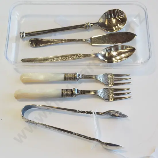 sugar tongs, teaspoons, forks