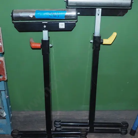 pair of metal roller stands