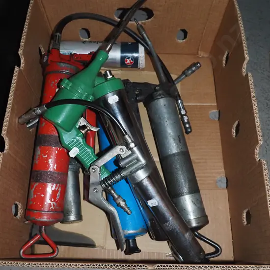 box; grease guns, adjusting tension screw etc