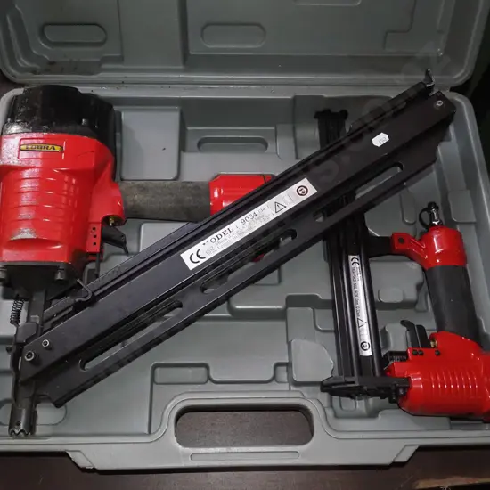 cased Cobra air powered nail and braiding gun
