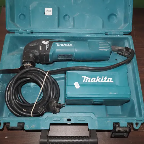 cased corded Makita multi tool and accessories