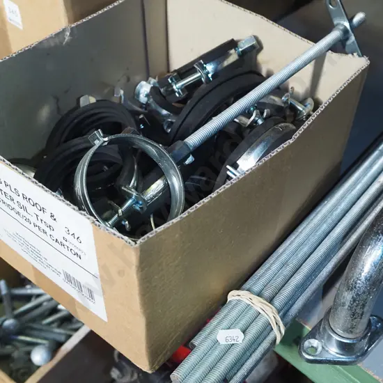 box of plumbers pipe clamps, bundle of threaded rods