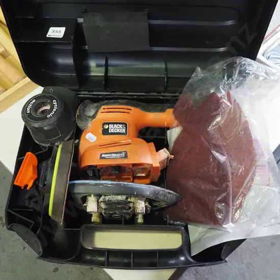 Black & Decker oscillating sander with various sanding pads