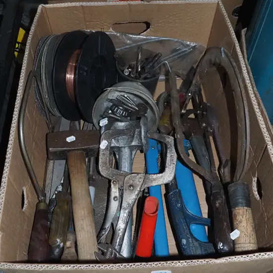 box; sickle, welding wires, heavy hammers etc