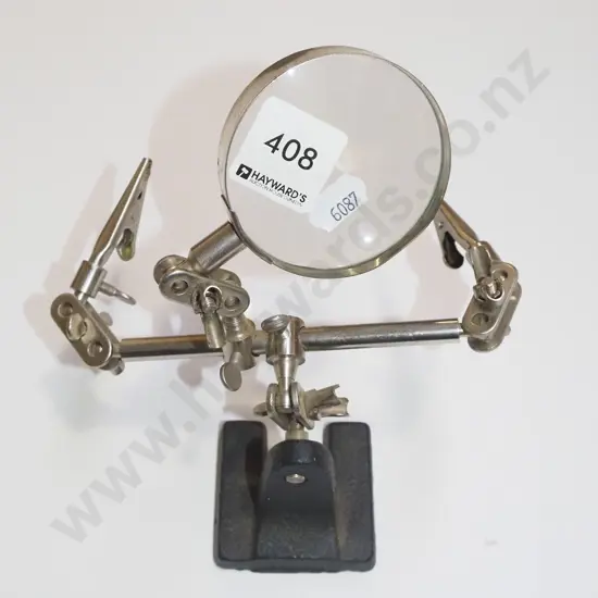 fishing fly tieing stand with magnifying glass