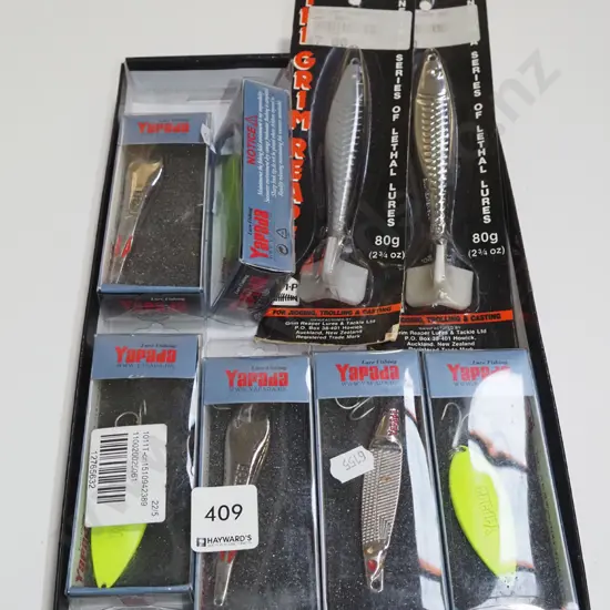 box of as new fishing lures