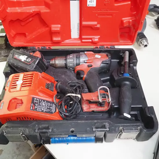 cased Milwaukee 18v battery drill with battery and charger