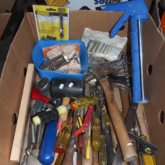 box; screwdrivers, caulking guns, rubber mallet etc