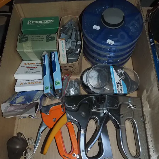 box; plumb bob, staple guns, staples etc