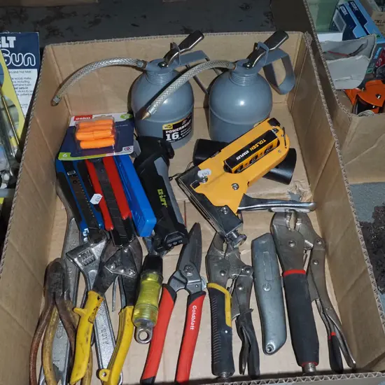 box; tin snips, oilers, vice grips etc