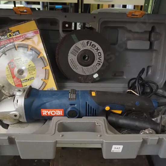 cased Ryobi angle grinder and accessories