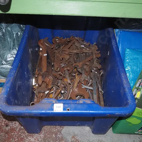 blue tub of rusty open end and ring spanners