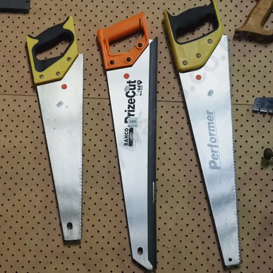 3x hand saws - red dots