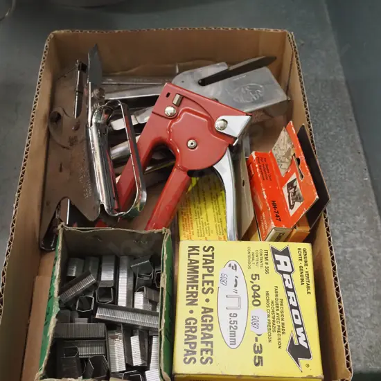 box of staplers and staples
