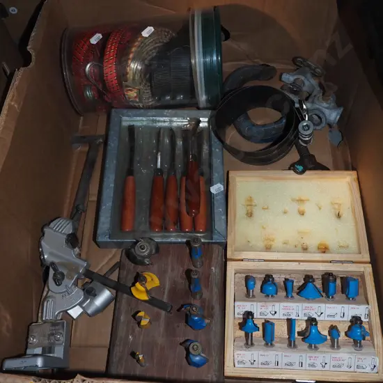 box; bungees, carving chisels, router bits etc