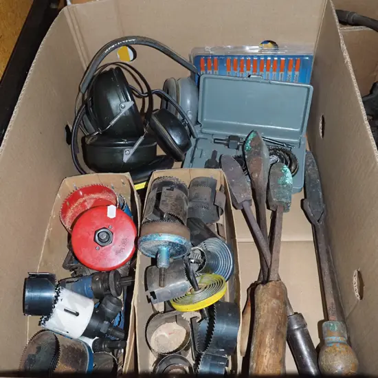 box; hole saws, ear muffs, vintage soldering irons etc