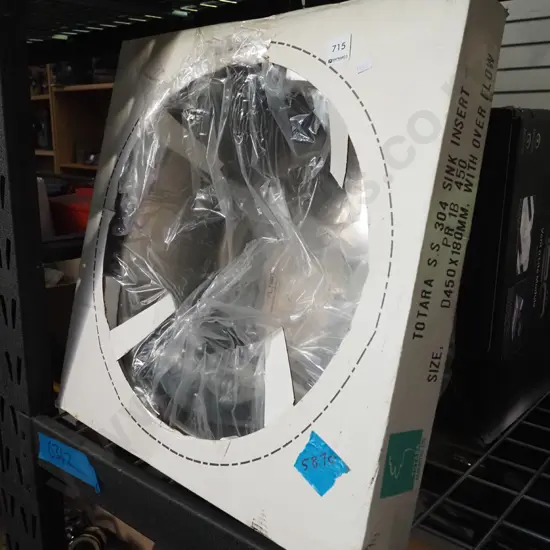 as new circular stainless steel sink with accessories