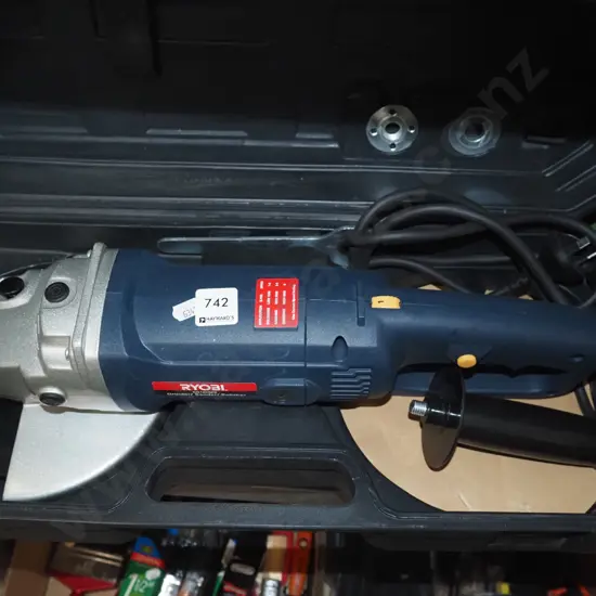 cased Ryobi angle grinder  