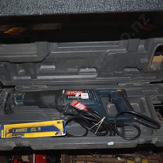 cased Ryobi corded sabre saw